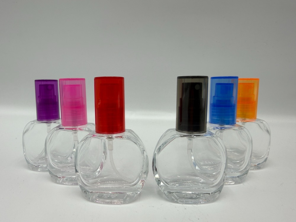 شیشه عطر 12 میل گرد بی رنگ درب پلاستیکی کد 466